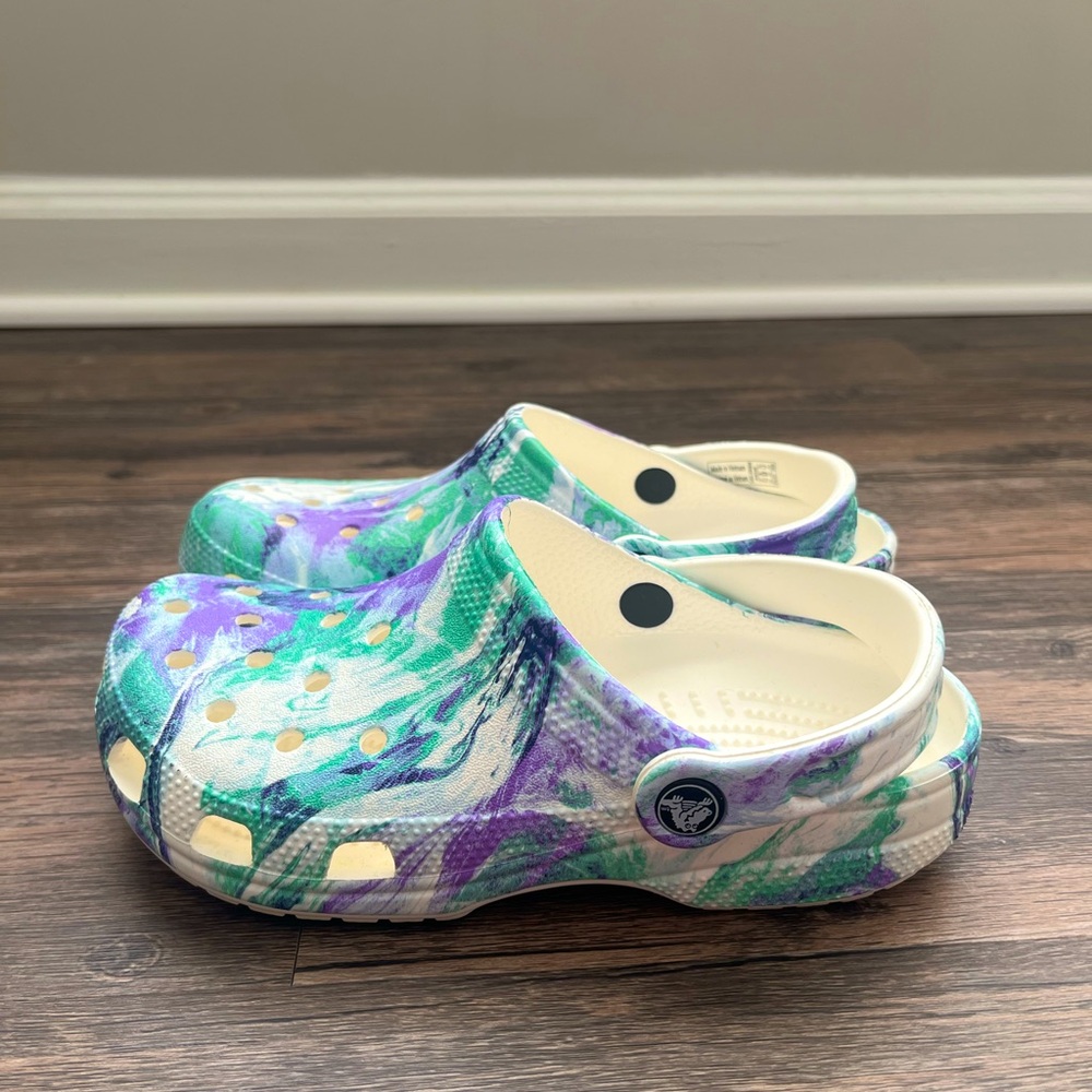 Purple and green marbled crocs.
